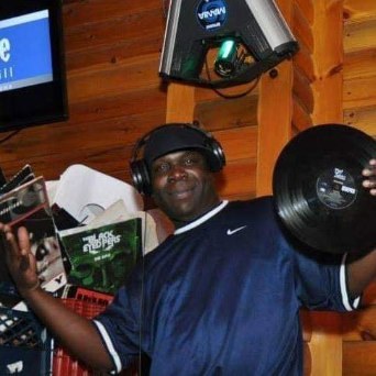 Sheldon spinning vinyl — records in hand